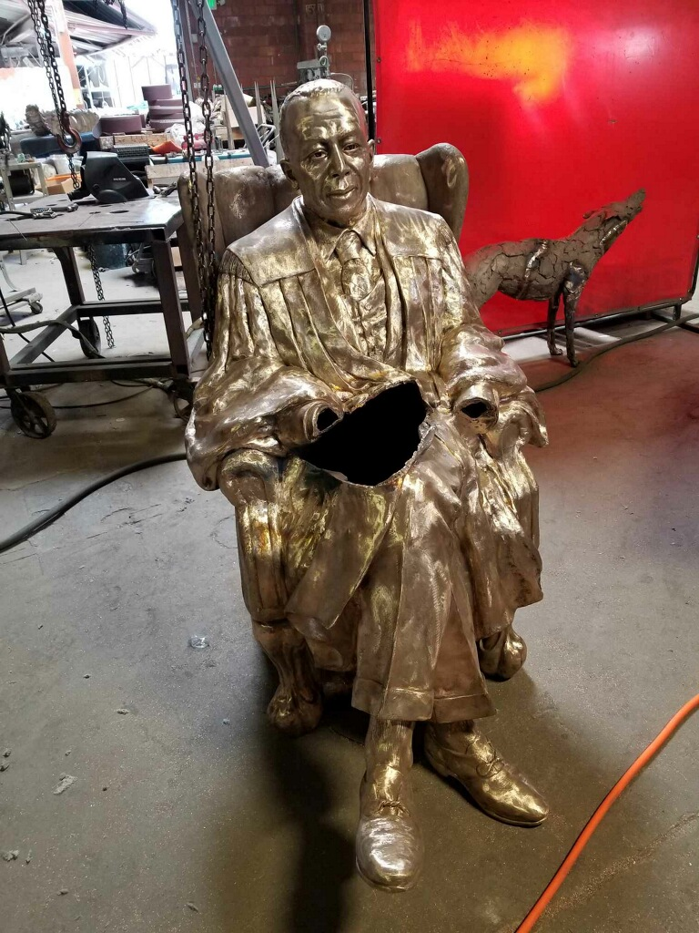 Initial bronzing of the statue